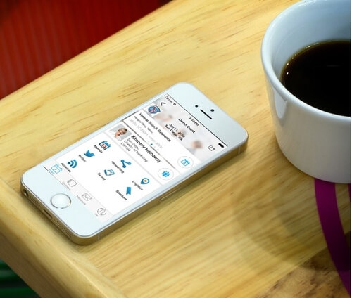 Coffee on Table with Whova mobile app