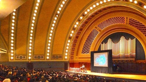 a speaker giving keynote at a conference