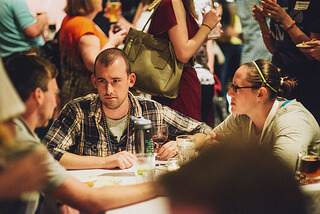 attendees-talking-at-table